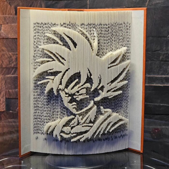 From Pages To Pixels: The Enchanting Sculptures Of Book Master