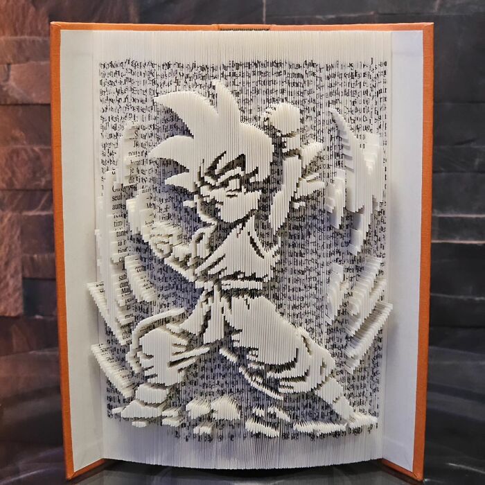 From Pages To Pixels: The Enchanting Sculptures Of Book Master