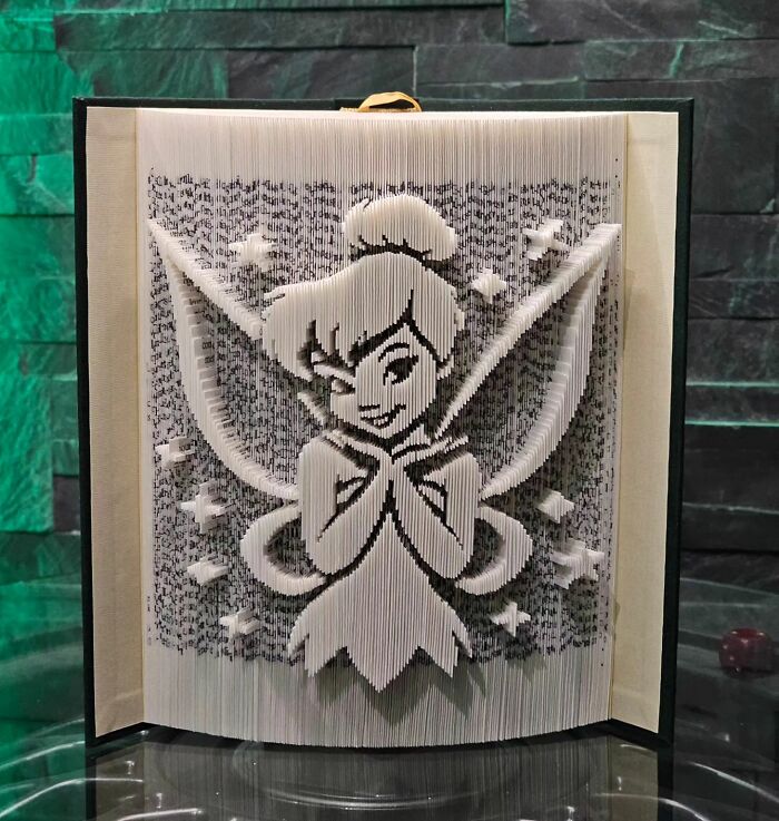 From Pages To Pixels: The Enchanting Sculptures Of Book Master