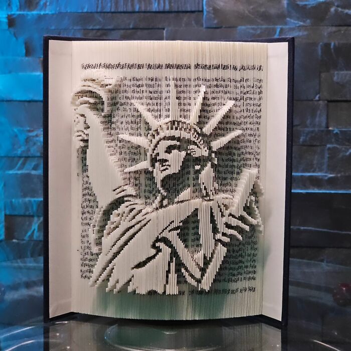 From Pages To Pixels: The Enchanting Sculptures Of Book Master