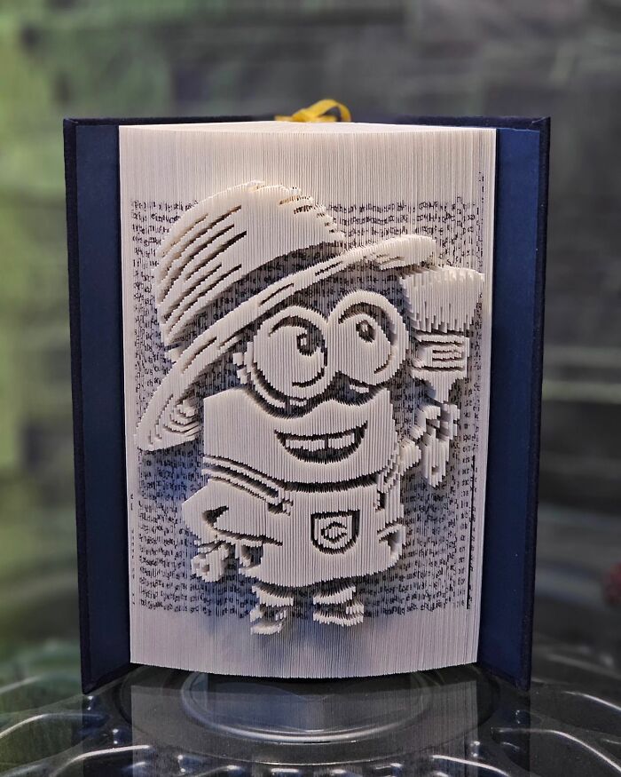 From Pages To Pixels: The Enchanting Sculptures Of Book Master