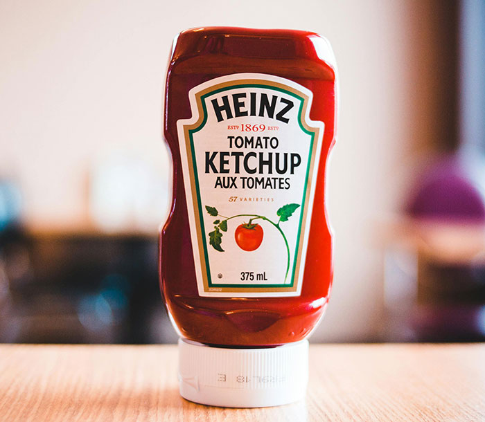 Days After Apologizing For Erasing Black Dads, Heinz Slammed For New “Blackface” Ketchup Ad