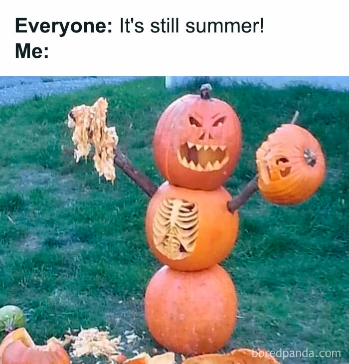  A Halloween-themed October meme featuring a carved pumpkin creature with a spooky face, holding pumpkin guts and another carved pumpkin head. Text reads, "Everyone: It's still summer! Me:"