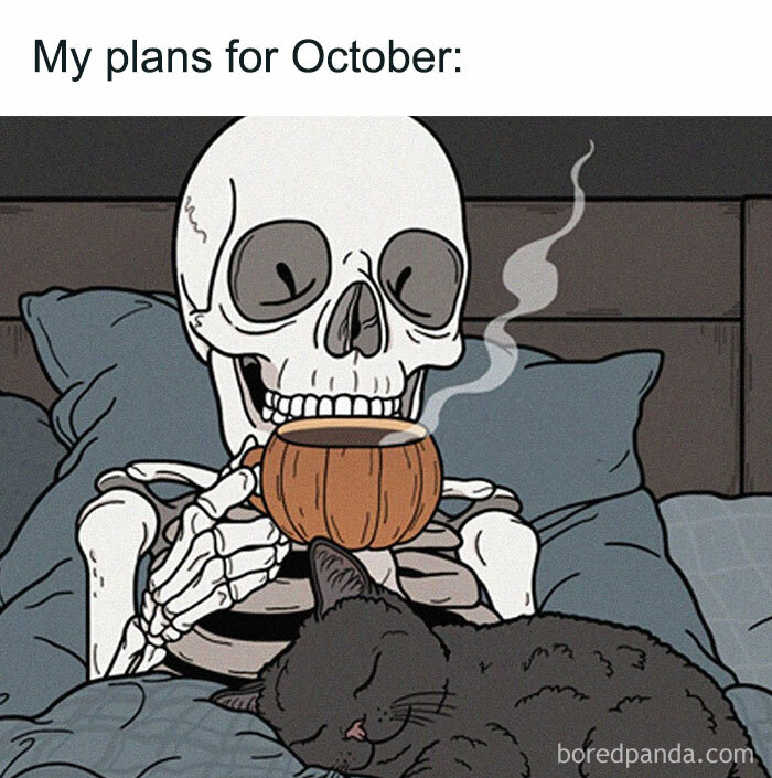 An October meme with a skeleton relaxing in bed, holding a steaming cup, with a sleeping black cat beside it. Text above reads, "My plans for October."