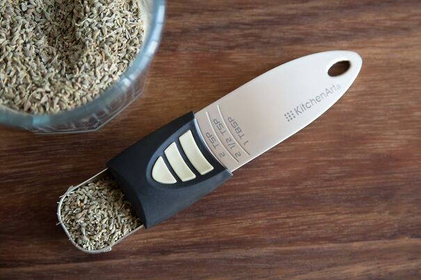 Measure Up To Perfection With The Versatile Adjustable Measuring Spoon, A Clever Kitchen Tool That Slides, Adjusts, And Scoops With Ease, Making Recipe Prep A Breeze