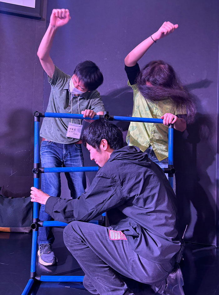 Part-Time Worker Supporting The Fence At The Front Of A Live Concert