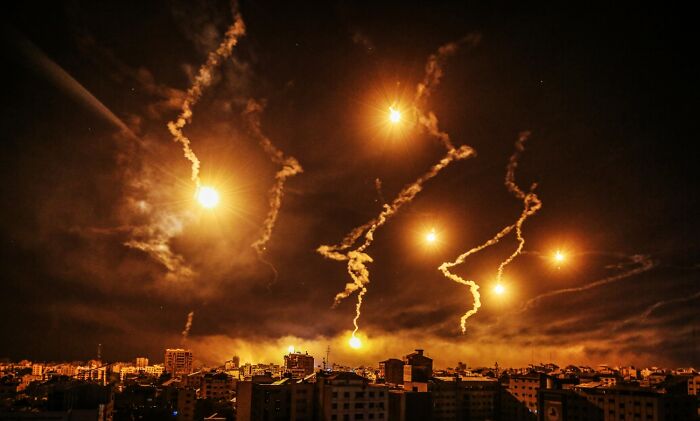 Documentary & Photojournalism, Remarkable Artwork: Attacks Lighting The Night By Ali Jadallah