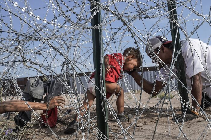 Documentary & Photojournalism, 3rd Classified: The Last Barrier By By Michael Robinson Chávez