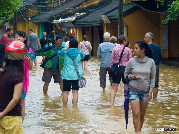 Tourists Take Photos Of Flood Water In Hoi An Ancient Town