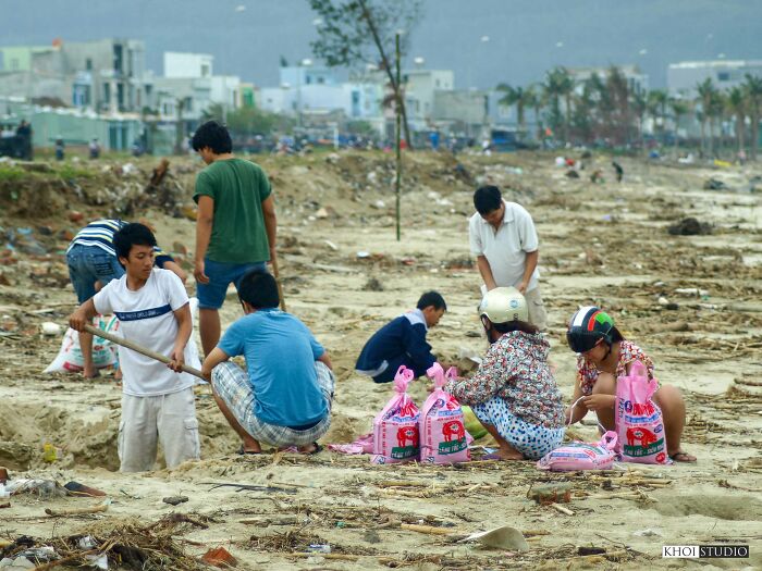 Locals Scoop Up Sand From The Beach, And Put It In Small Bags To Take Home To Support The Roof