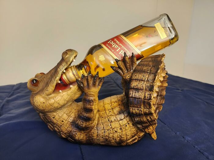 Who Needs A Sommelier When You Have This Guy? This Crocodile Wine Stand Will Guard Your Wine With His Life (Or At Least Until You're Ready To Pour A Glass)