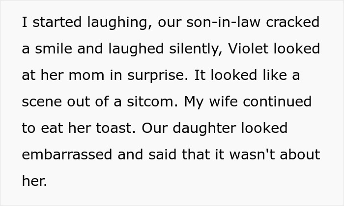 Family sitting together, surprised and amused, during a humorous moment featuring a mom's scolding that went awry.