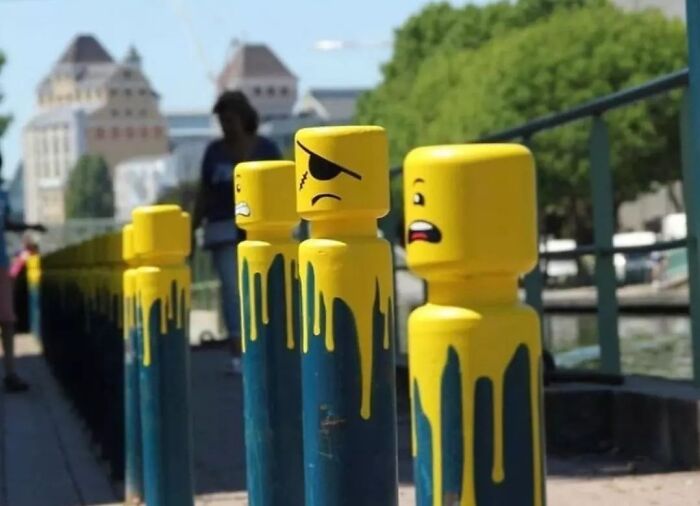 French Street Artist Le Cyklop Transforms City Bollards Into Anthropomorphic, LEGO-Inspired Caricatures