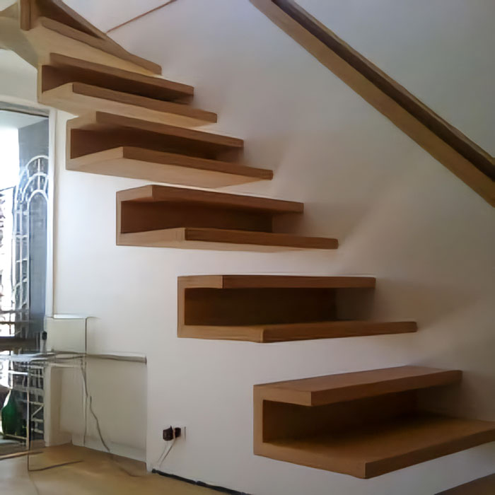 A Modern Floating Staircase With Wooden Steps Is Looking Like Trip To The Hospital