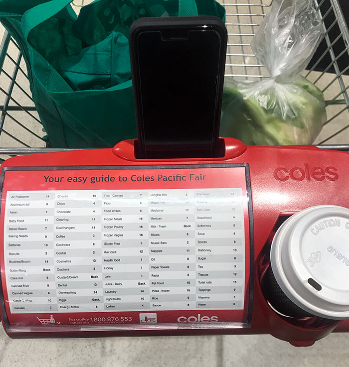 This Grocery Store Cart Has A Cup Holder, Slot For Your Phone, And An Aisle Guide For Popular Products