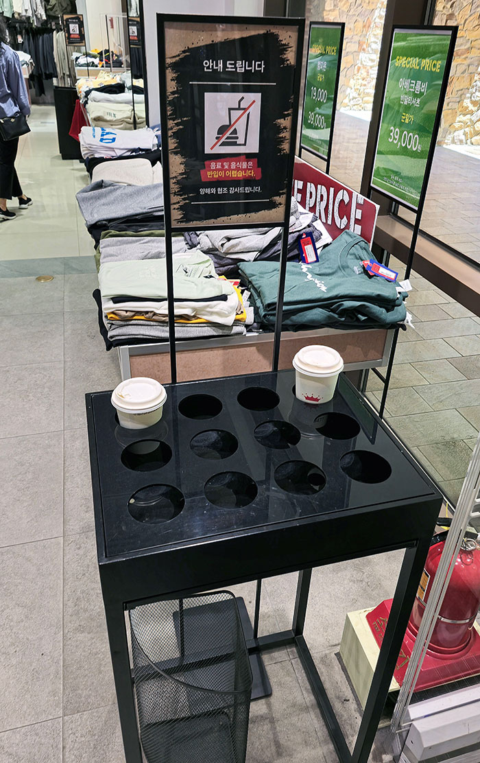 Some Stores In Korea Have A Spot To Leave Your Coffee So You Can Browse Without Carrying It Around