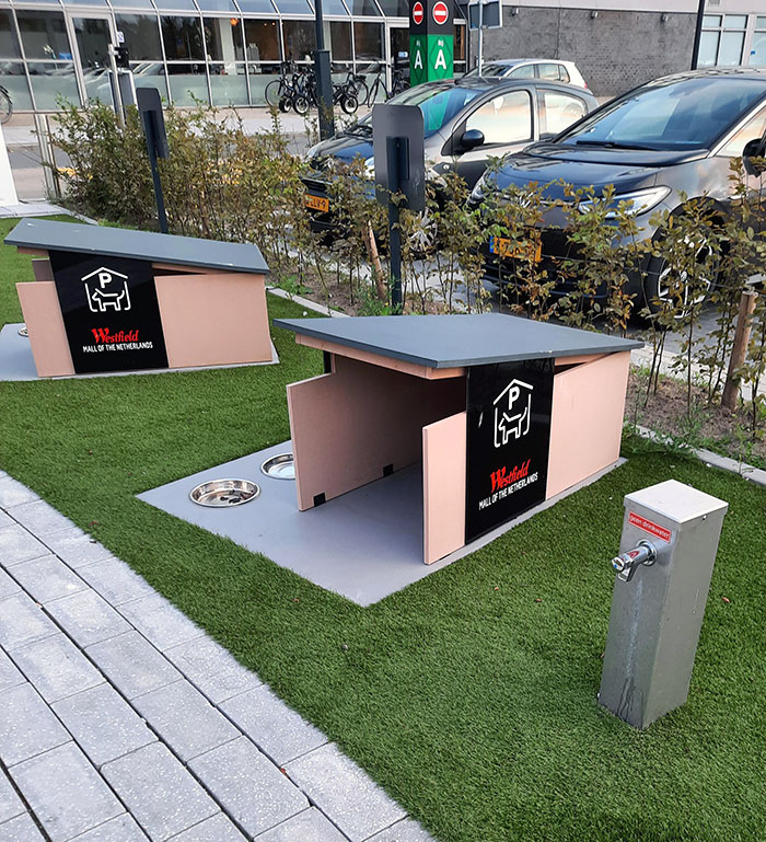 Parking Spots At The Mall Where You Can Park Your Dog So You Can Go Shopping. It Comes With A Food And Water Bowl