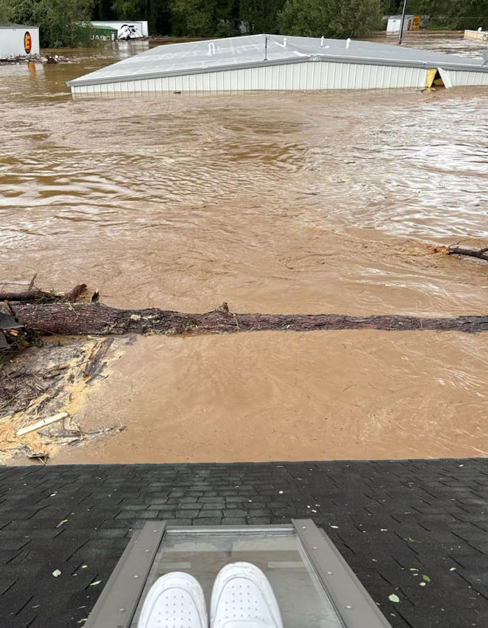 A North Carolina Resident Surrounded By Floodwaters