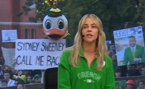 Sydney Sweeney Gives Savage Response To Mascot Asking Her To “Call Them Back” On Live TV