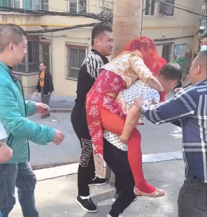 Bride Taped To Phone Pole Sparks Heated Debate Over Wedding Hazing Customs