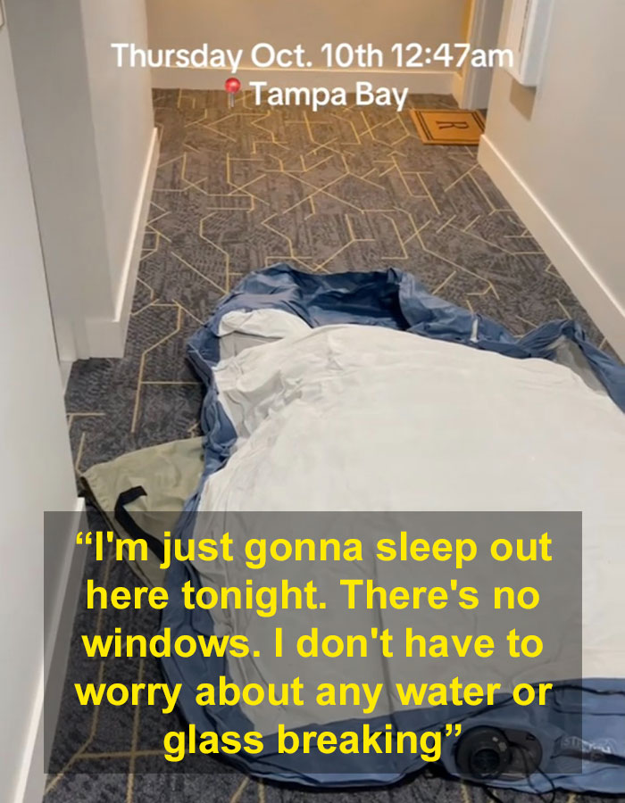 Woman Camps Out In Hallway As Hurricane Milton Seeps Through High-Rise Apartment Windows