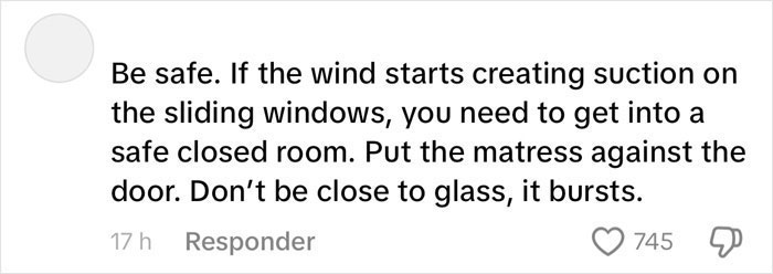 Woman Camps Out In Hallway As Hurricane Milton Seeps Through High-Rise Apartment Windows