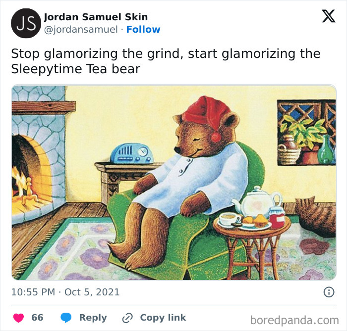 Cozy bear in a robe and hat resting by a fireplace, relatable meme for those above 30 valuing relaxation over hustle.