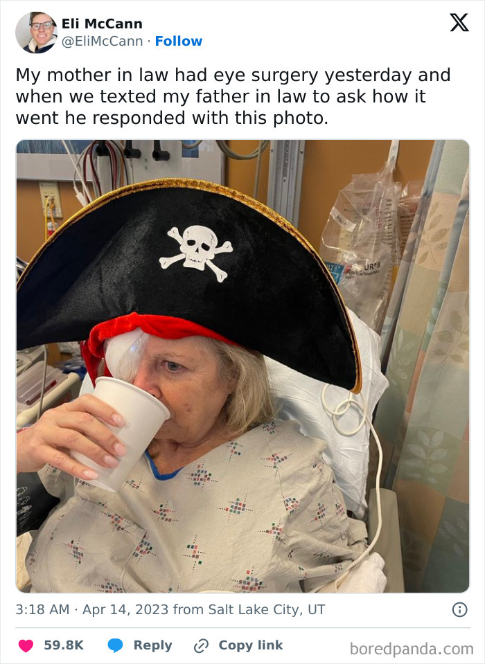 Elderly woman in pirate hat drinking from a cup after eye surgery, capturing a humorous in-law moment.