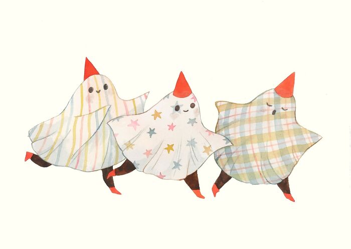 Wholesome illustration by Taryn Knight of three ghost figures in colorful patterned sheets and red hats.