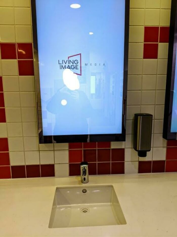 They Replaced Half The Mirrors In My Local Shopping Mall's Bathroom With Advertising Boards