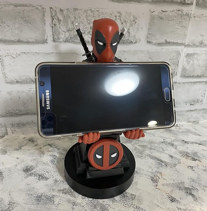 Hang Tight To Your Phone With The Deadpool Phone Holder