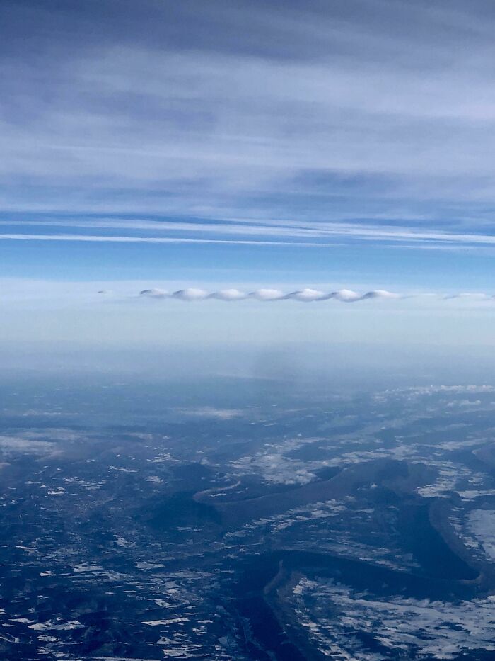 This Funky Little Ribbon Cloud Outside My Plane Window