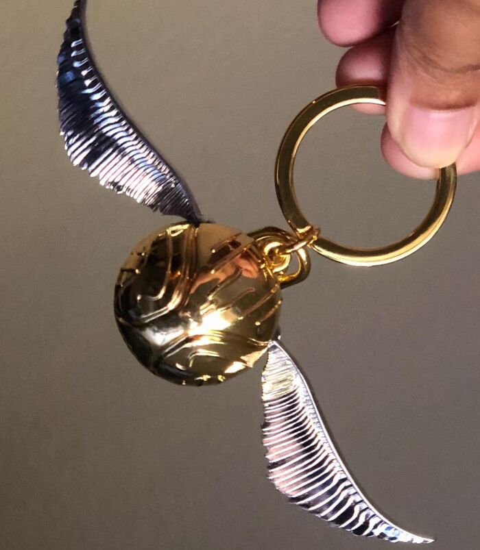 Catch A Glimpse Of Magic With The Snitch Key Ring, A Charming Accessory Inspired By Quidditch's Elusive Golden Snitch