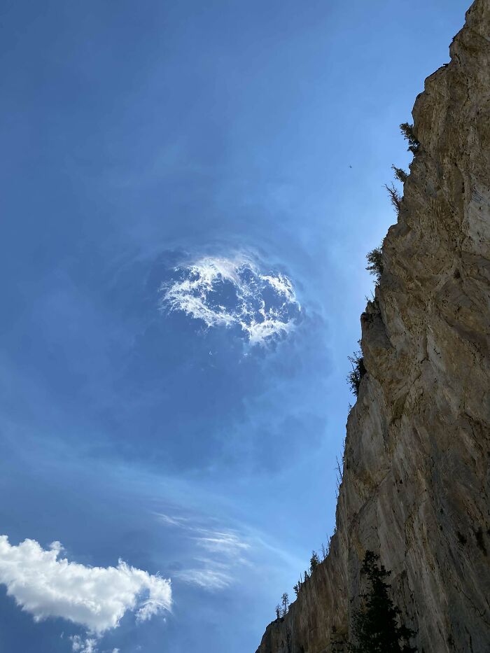 Took These Photo Earlier Today On A Hike At Mount Charleston, Nevada. Me And My Friend Couldn’t Help But Notice How This Cloud Looked Liked A Portal/Moon. I’ve Never Seen Anything Like This In My Life