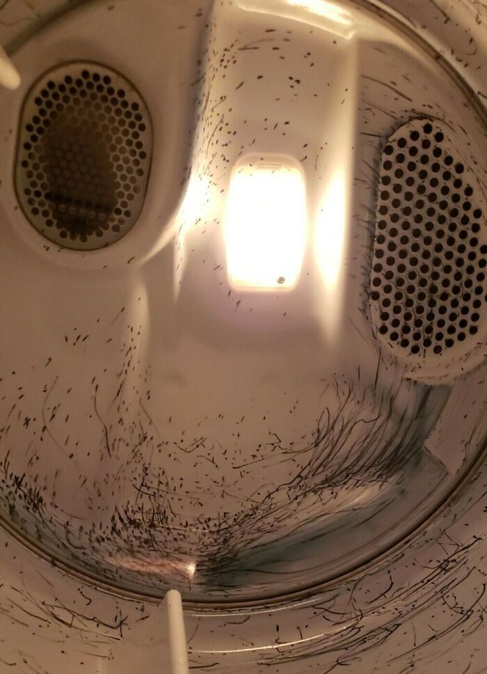 Ink stains inside a dryer, likely caused by a careless boyfriend or husband.