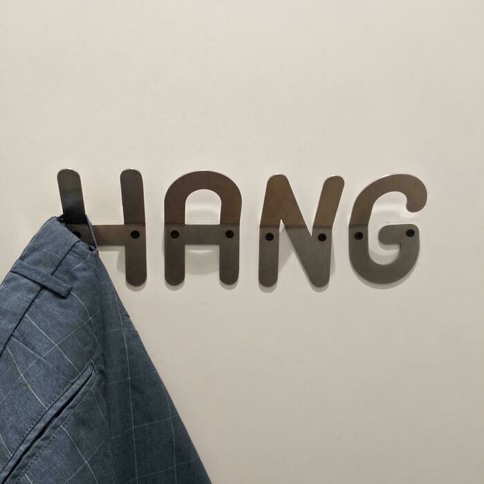 Hanger In A Trial Room. Yes, Half Of It (Like The Letter A) Could Not Be Used For All Type Of Clothes, But Still It Does The Job And Is Cool