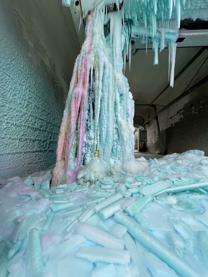 Colorful icicles and ice formations in a winter scene, showcasing a vibrant ice-cold display.