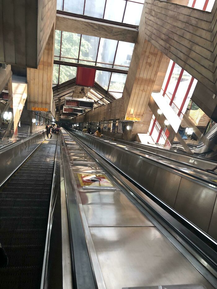 Very Long Escalator At The Subway Station In Chongqing, China