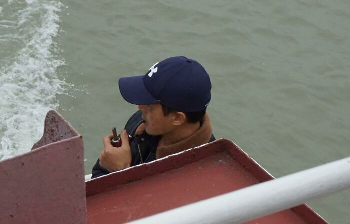 This Man In China Smoking A Cigar Through A Pipe