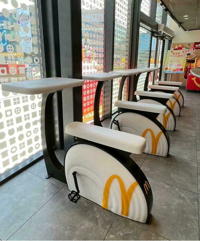 Exercise Bikes At A McDonald's In China. The Bikes Generate Electricity As Part Of The Chain's "Upcycle For Good" Initiative And Can Be Used To Charge Your Phone