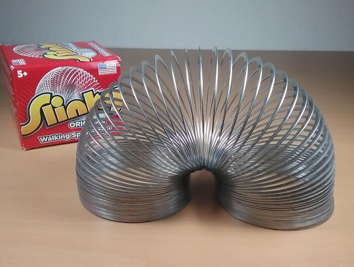 This Original Slinky Is The Classic Toy That's Been Walking Down Stairs (And Into Our Hearts) For Generations