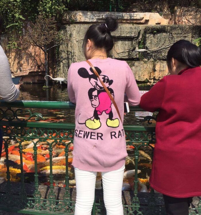 My Girlfriend's In China, She Sent Me Photo Of Girl Wearing Mickey Mouse Shirt, But Something's Not Quite Right