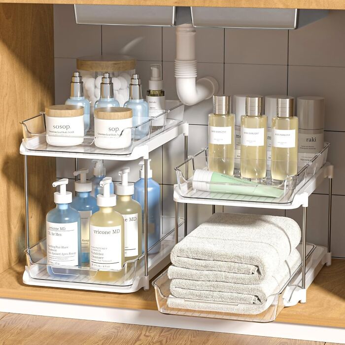 Tired Of Playing A Real-Life Game Of Jenga Every Time You Reach For The Dish Soap? These Under Sink Organizers With Movable Drawers Will Bring Order To The Chaos Under Your Sink And Make Finding Your Cleaning Supplies A Breeze