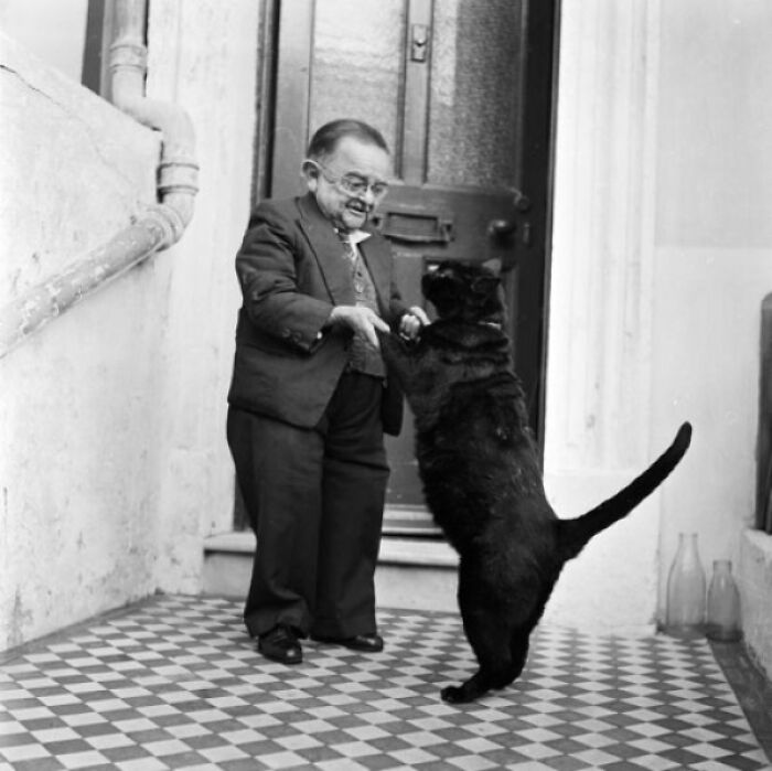 World's Smallest Man Dancing With His Pet Cat. 26th October 1956