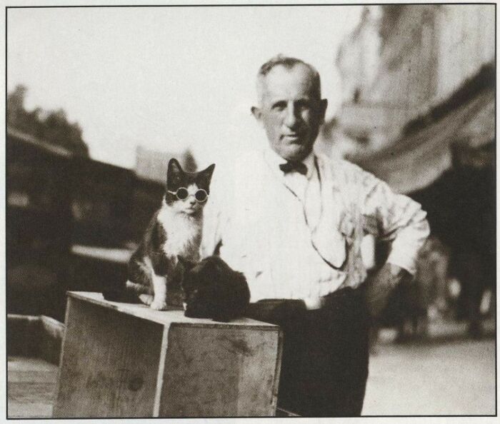 1940s Kentucky Man Posing With His Sunglass Wearing Cat