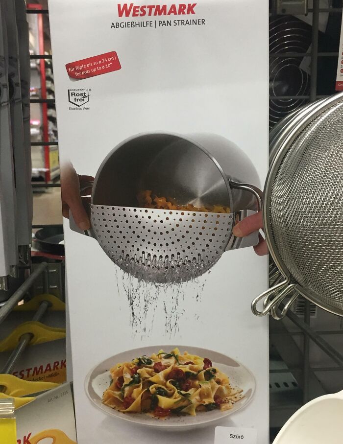 Pan strainer, leaking water onto a plate of pasta, demonstrating a funny ad fail.