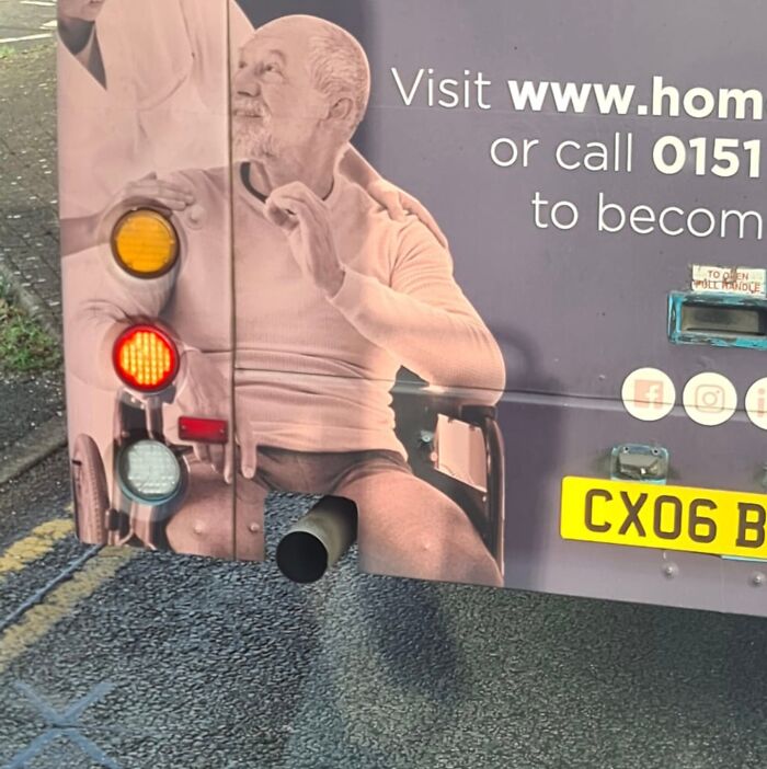 Funny-Ad-Fails: Exhaust pipe hilariously aligns with man's shorts in a wheelchair advertisement on a vehicle.