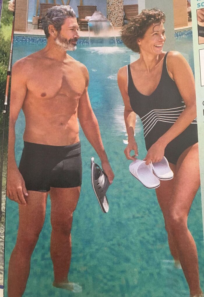 Couple standing with mismatched reflections, creating funny ad fail by appearing half-submerged in a pool.