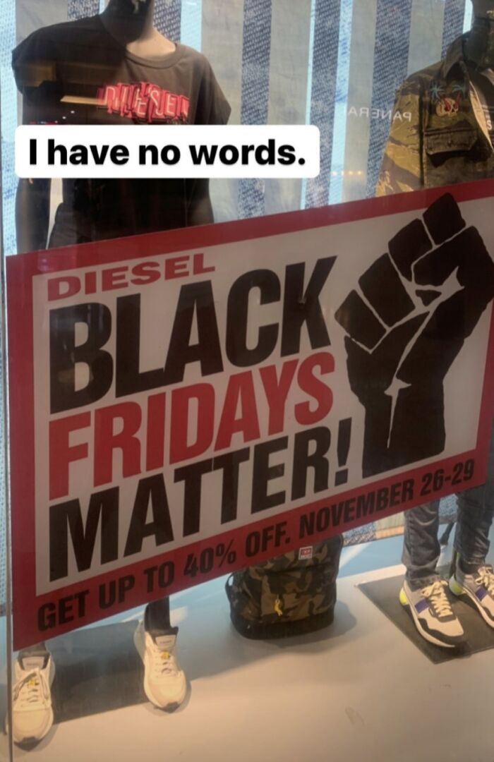 Storefront display with controversial "Black Fridays Matter" sign, showcasing a funny ad fail.