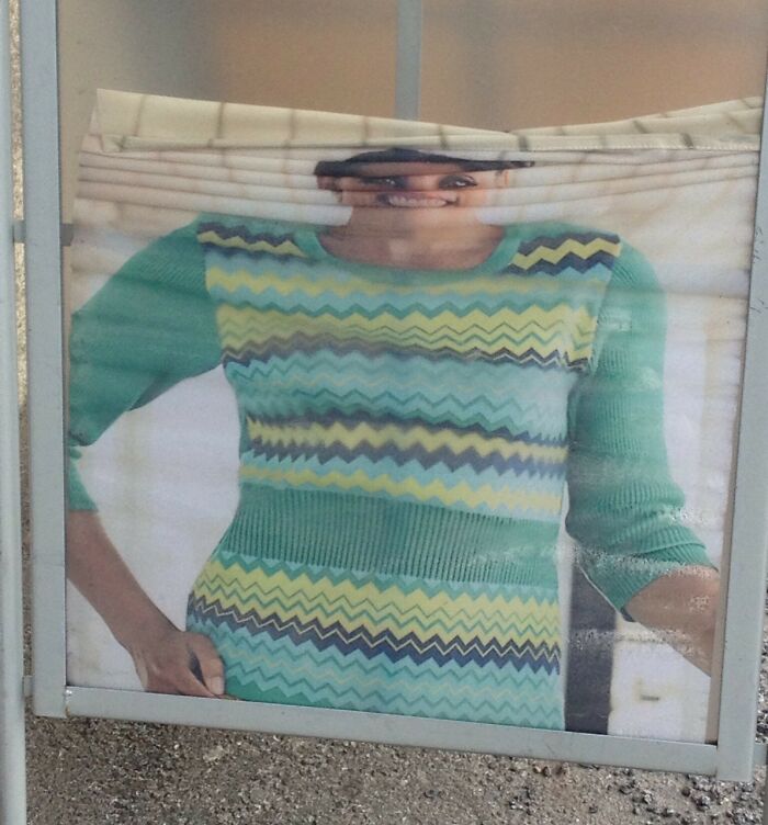 Ad fail showing a distorted mannequin photo with a zigzag sweater, causing an amusing visual mishap.